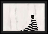 An elegant figure in black and white against a soft background-4