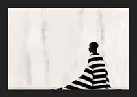An elegant figure in black and white against a soft background-5