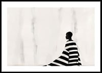 An elegant figure in black and white against a soft background-0