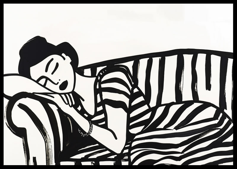 She rests dreamily on a striped sofa in monochrome elegance.-12