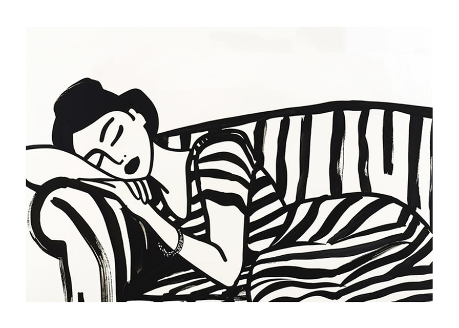 She rests dreamily on a striped sofa in monochrome elegance.-12