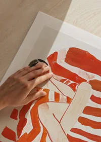 A resting figure wrapped in an intense red and white striped pattern-9
