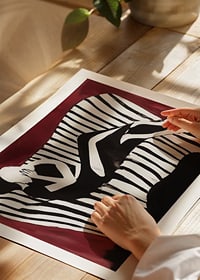 Intimate silhouettes on a striped sofa against a dark background-8