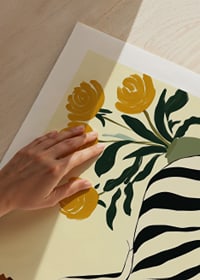 An elegant woman in a striped dress surrounded by golden flowers-9