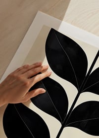 Stylized black leaves on a cream-colored background create modern elegance-9