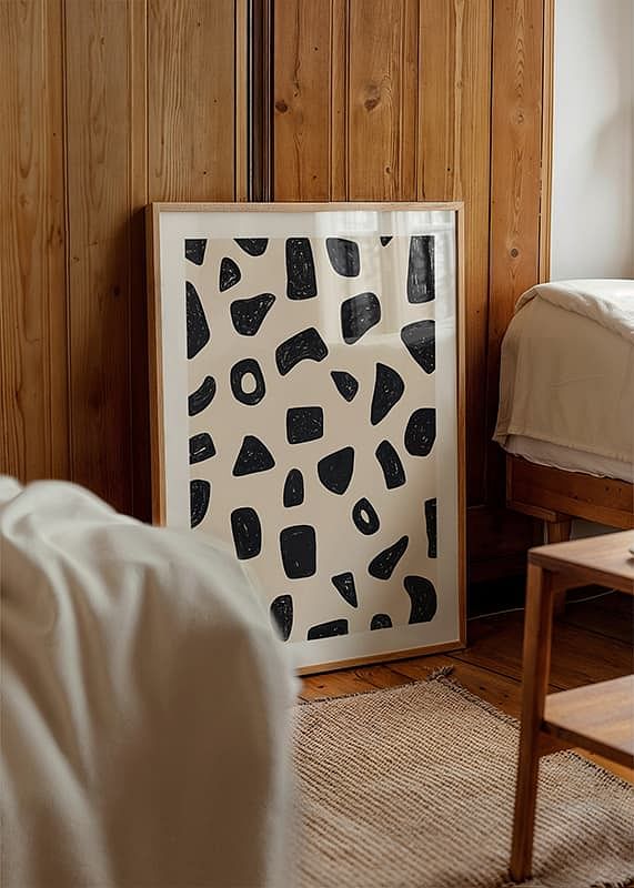 Sorte og hvide former på en beige baggrund skaber rytmisk elegance-12