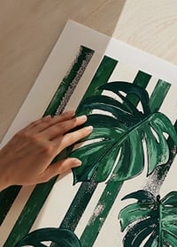 Monstera leaves in bold green and white stripes create life and style-9