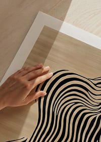 Black lines flow over beige background, creating movement-9