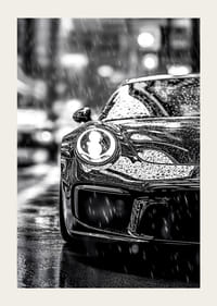 A car captures the elegance of the city in heavy rain-3