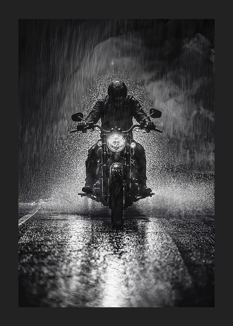 Bold motorcyclist braves the rain in dramatic scene-12