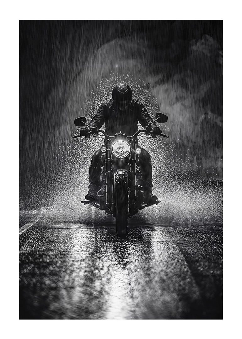 Bold motorcyclist braves the rain in dramatic scene-12