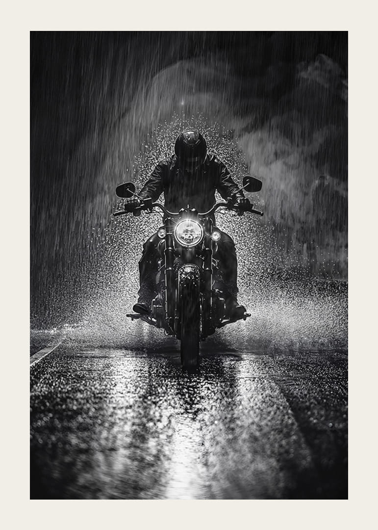 Bold motorcyclist braves the rain in dramatic scene-12
