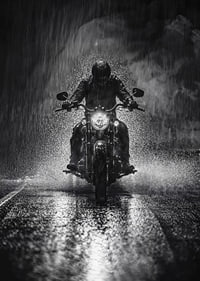 Bold motorcyclist braves the rain in dramatic scene-7