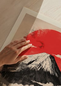 Dramatic red sun behind majestic mountain, a tribute to the beauty of nature-3