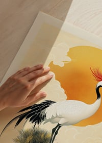 A stylish crane balances against a majestic golden sunset-3