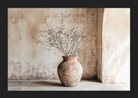 A rustic pot with twigs against a softly patinated wall-5