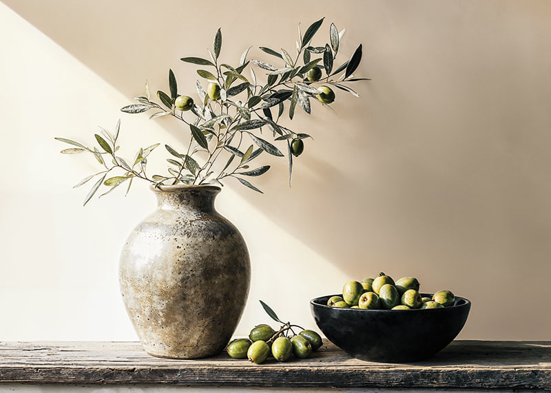 Olive branches in a vase create rustic charm and tranquility-12