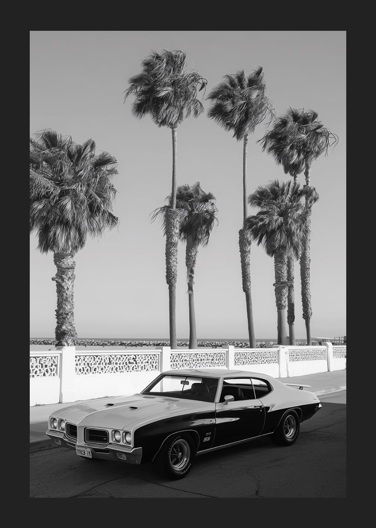 A classic muscle car is parked by the sea under swaying palm trees.-12