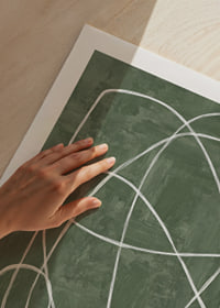 Soft lines squiggle on a deep green background.-9