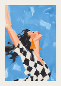 A woman reaches towards the sky in a sense of freedom.-3