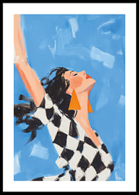 A woman reaches towards the sky in a sense of freedom.-0