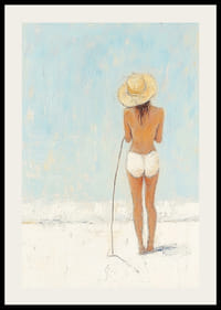 A woman stands on the beach and looks out over the sea.-2