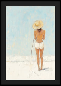 A woman stands on the beach and looks out over the sea.-4
