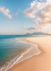A dreamy shoreline meets the clear blue sea.-7