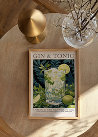 Fresh gin and tonic with lime slices in a green forest theme.-2