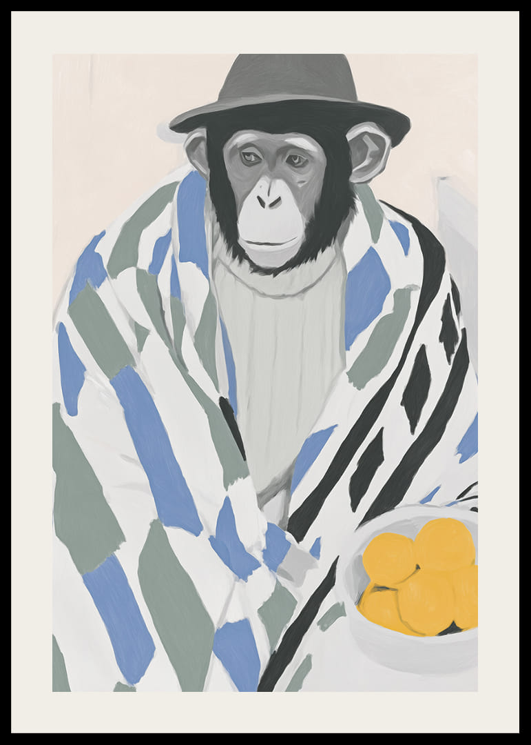 Un mono pensativo envuelto en una manta estampada con un tazón de limón.-12