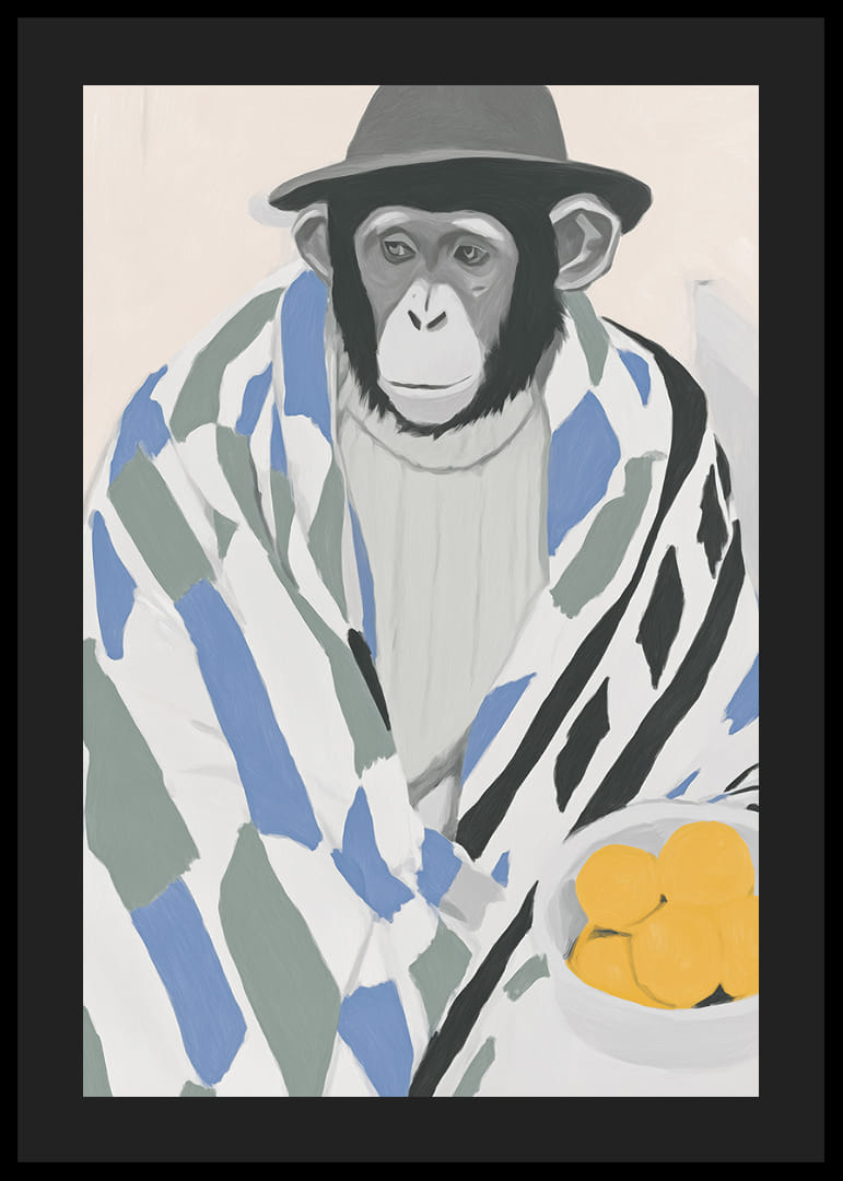 Un mono pensativo envuelto en una manta estampada con un tazón de limón.-12