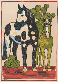 Colorful horses surrounded by cacti create magic.-1