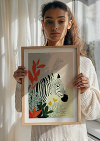 The zebra rests surrounded by vibrant colors and natural beauty.-8