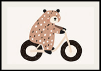 A spotted bear rides a bike with joy and charm.-2