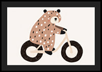 A spotted bear rides a bike with joy and charm.-4