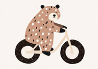 A spotted bear rides a bike with joy and charm.-7