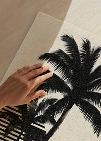 Silhouettes of palm trees against a dreamy background.-3