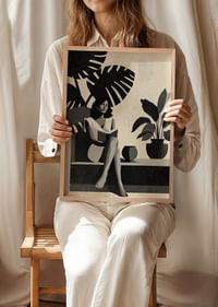An elegant silhouette of tranquility surrounded by tropical leaves.-2