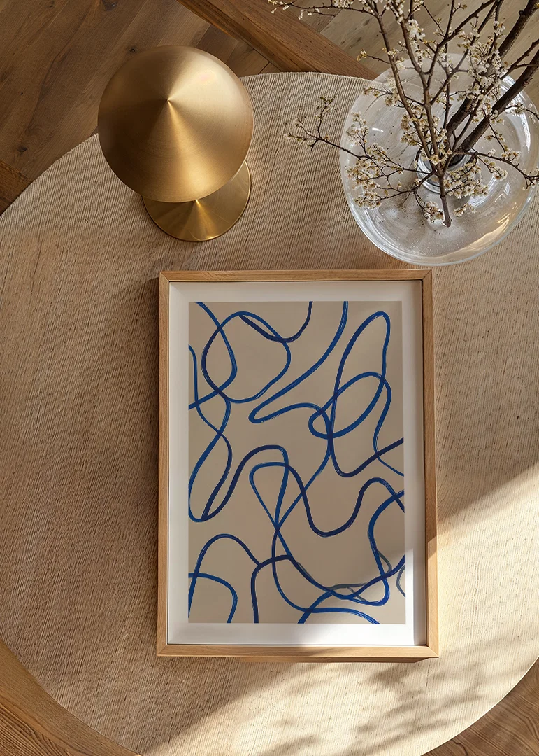 Deep blue lines sweep in an elegant abstract pattern.-12
