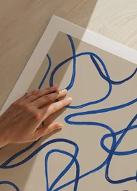 Deep blue lines sweep in an elegant abstract pattern.-9