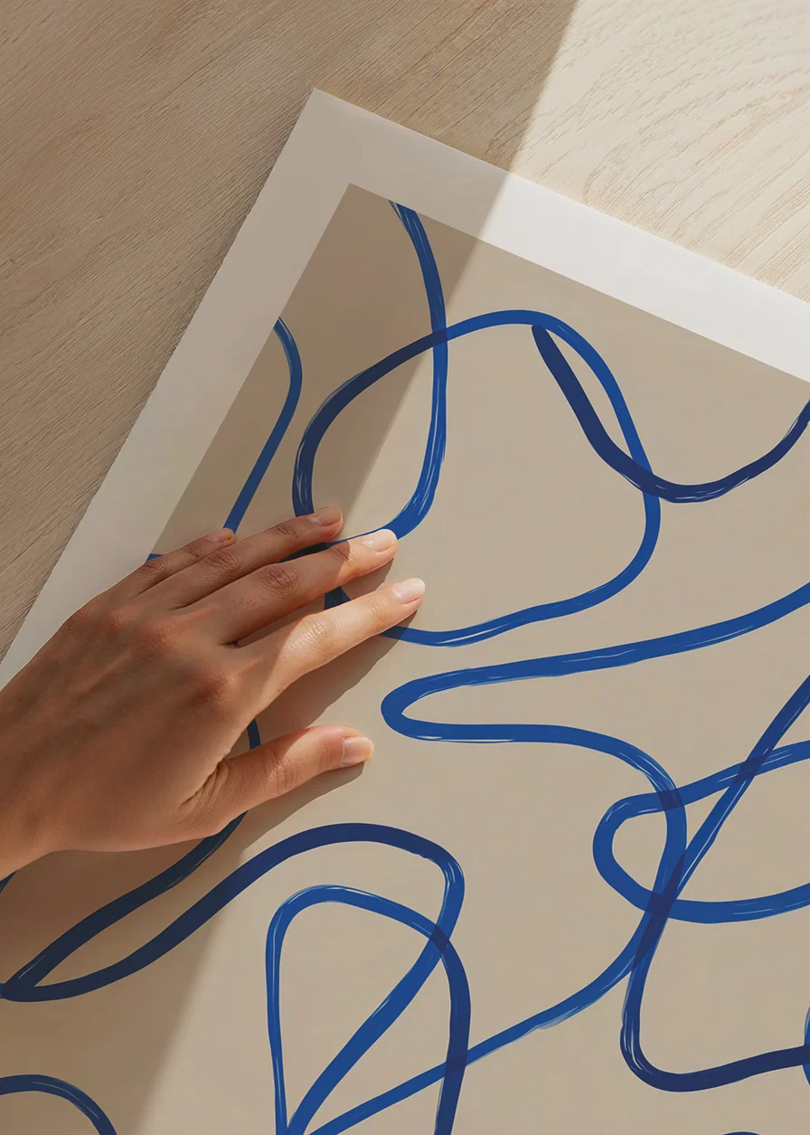 Deep blue lines sweep in an elegant abstract pattern.-12