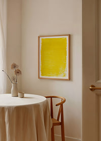A brilliant yellow poster that lights up the room.-2