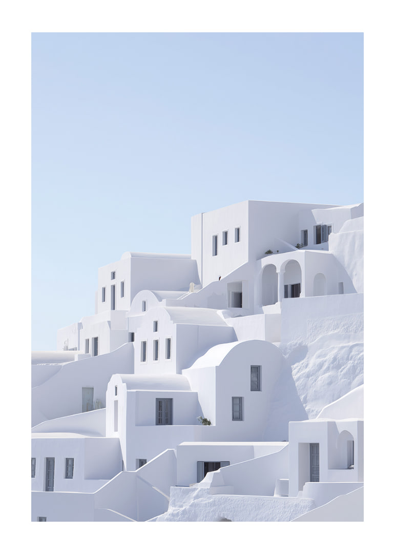 White harmony among the rocks by the azure sea.-12
