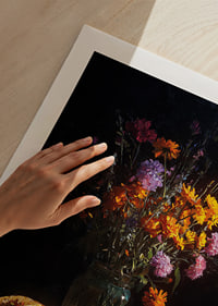 Colorful flowers and a taco in dim light create mystery.-9