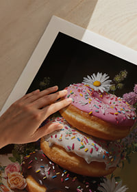 Colorful donuts surrounded by floral splendor create a tasteful harmony.-9
