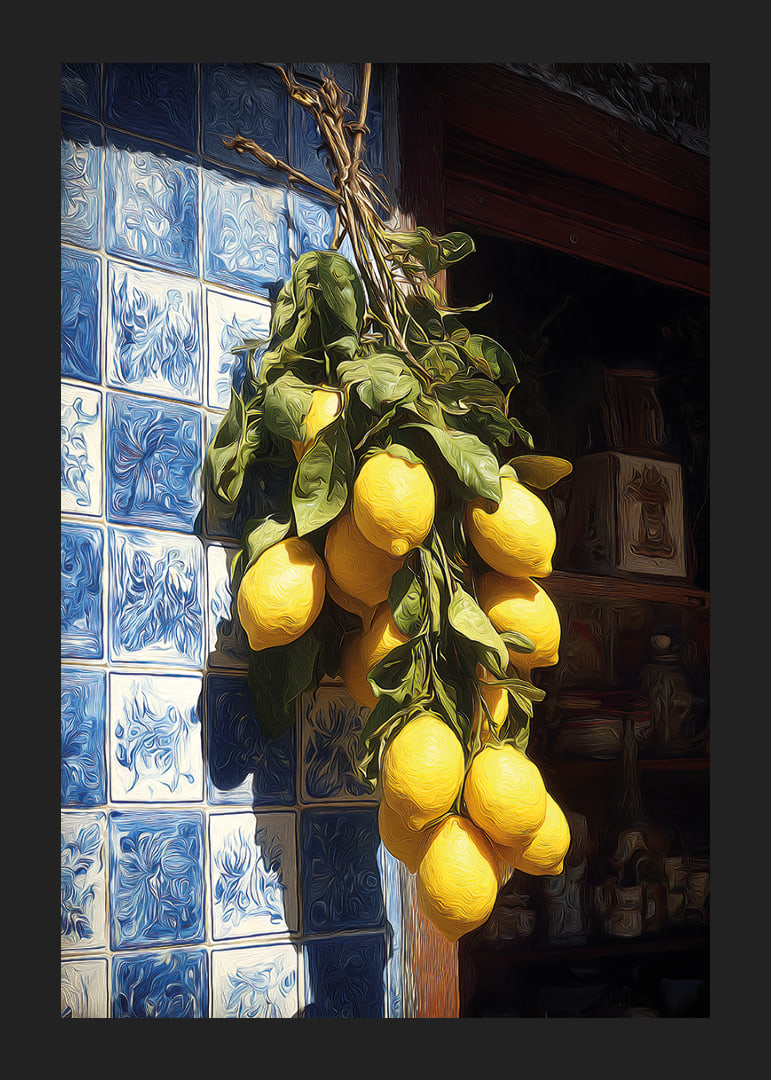 Vibrant lemons against an azulejo wall in the sunlight.-12