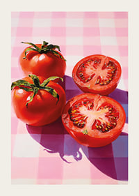 Juicy tomatoes shine on a checkered table.-3