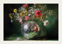 Flowers in a mirror vase that spread magic and elegance.-3