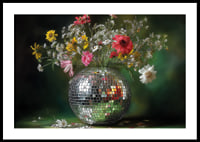 Flowers in a mirror vase that spread magic and elegance.-0