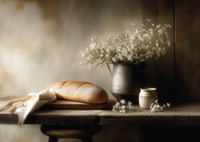 A harmonious still life with bread and flowers in soft light.-7